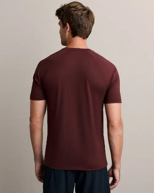 Back view of a men's burgundy athletic fit crew neck performance t-shirt