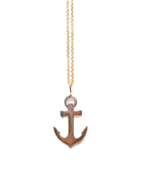 Small Pure Anchor Necklace in yellow gold on a white background.