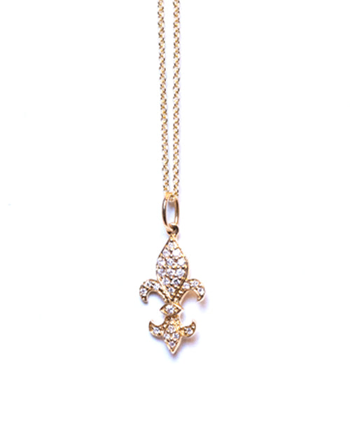 Small Fleur De Lis Necklace in yellow gold with pave diamonds on a white background.