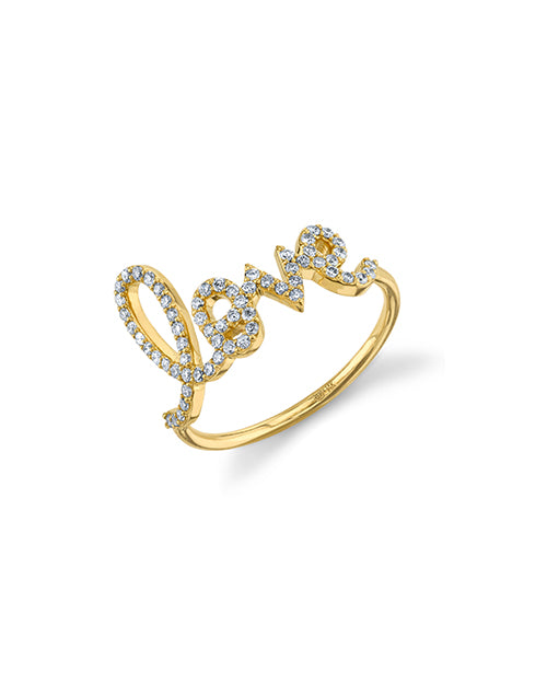 Love script ring with pave diamonds in yellow gold.