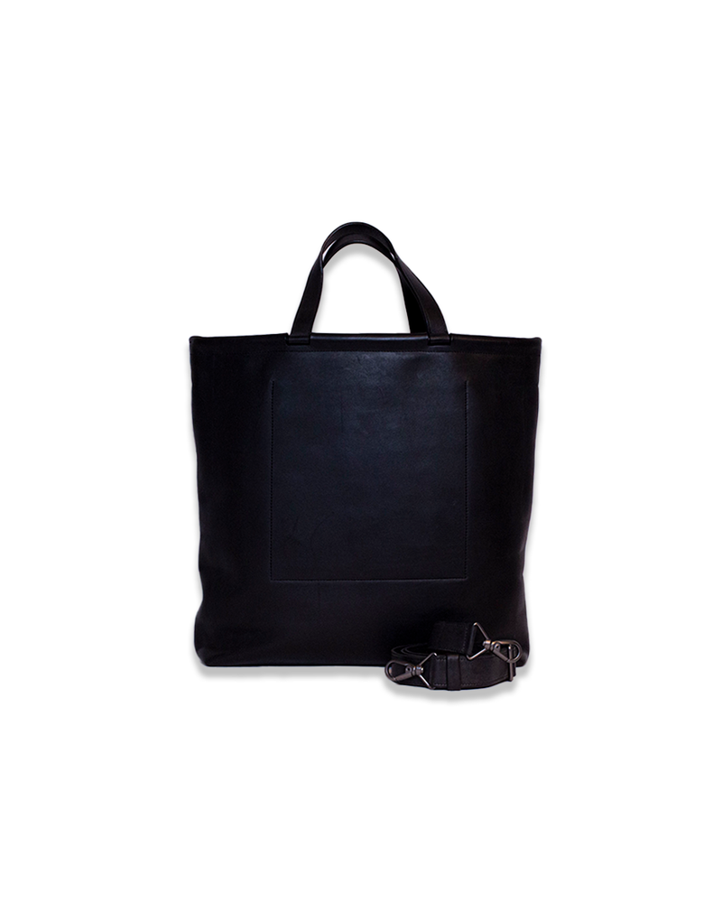 Black vertical tote bag with a handle and a detachable shoulder strap.