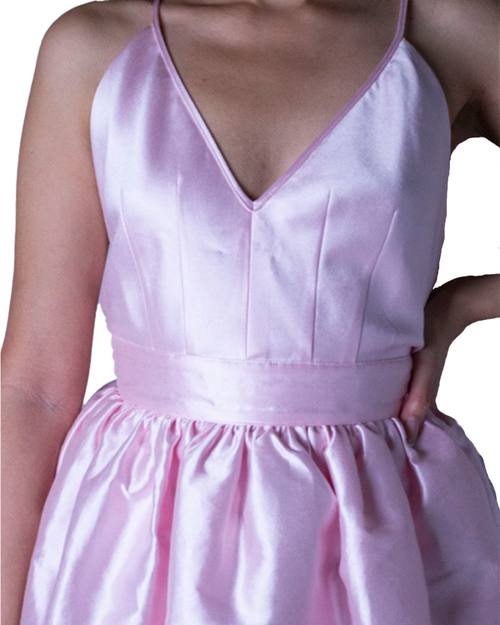 Close up of "The Dress" in pink to show fitted-style top.