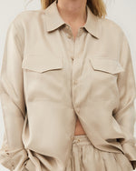Front view. relaxed fit of our Boyfriend Shirts are built with a button-down front and utility pockets.