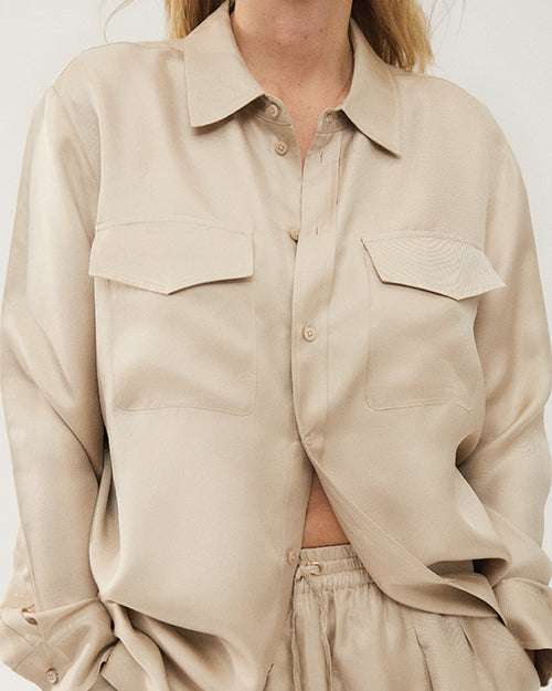 Front view. relaxed fit of our Boyfriend Shirts are built with a button-down front and utility pockets.