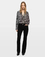 Black and white floral print blouse with long sleeves and V-neck