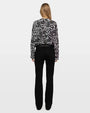 Black and white floral print long-sleeve blouse, back view