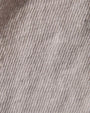 Close-up image of a white cotton long sleeve shirt.