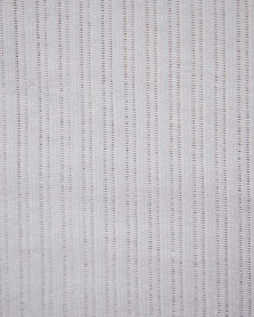 Detailed close-up image of a white tank top. 