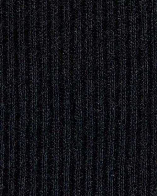  Close-up of a black cotton cashmere rib tank top featuring a fitted design and raw hem.