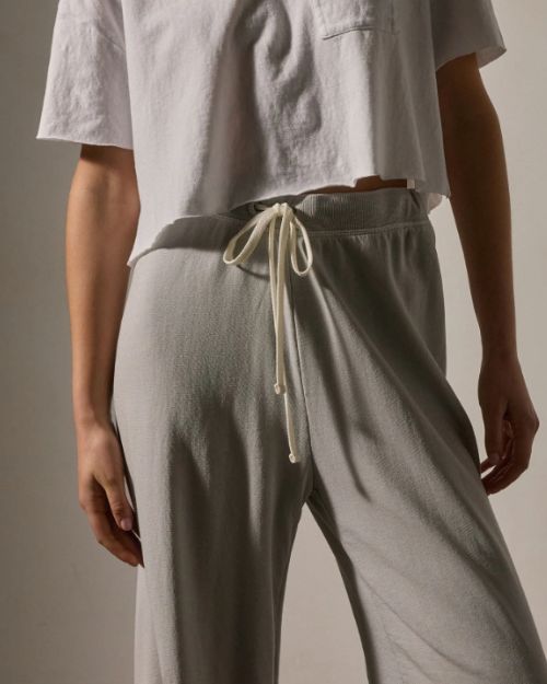 Stylish cropped top crafted from organic cotton, complemented by wide-leg sweatpants for a comfortable ensemble