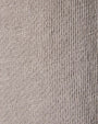 Close-up of a knitted fabric showcasing the texture of a Vintage French Terry Relaxed Sweatshirt.