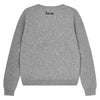 Back view of a gray long-sleeve knit sweater with a crew neckline. The sweater features the phrase ‘but nice’ embroidered in small navy blue script near the upper back. It has ribbed cuffs and hem.