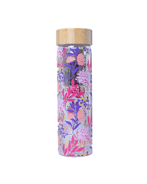 A clear cylindrical travel infuser mug with a floral pattern pink and purple. The mug includes a bamboo lid and detachable infuser.