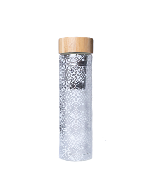A clear travel infuser mug with white floral patterns. The mug features bamboo lid and infuser.