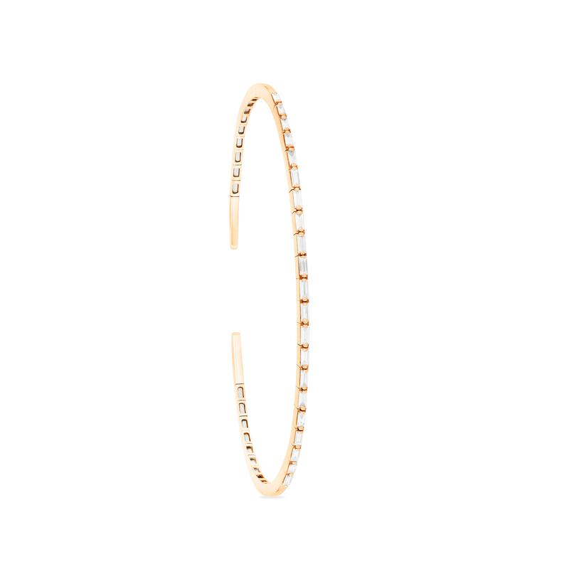 Thin gold bangle bracelet with diamonds. 