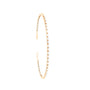 Thin gold bangle bracelet with diamonds. 