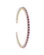 Thin gold bangle bracelet with pink sapphires. 