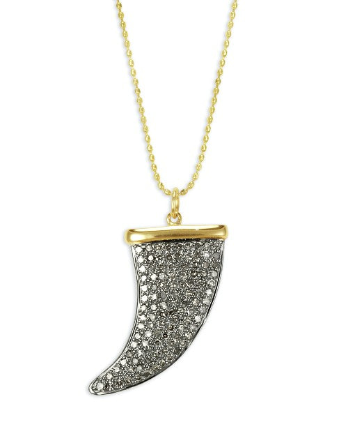 Gold chain necklace with diamond horn charm. 