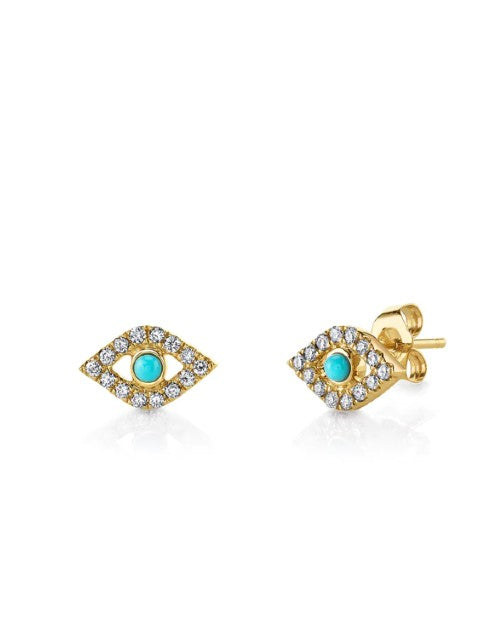 Gold stud earrings with Evil Eye design made from jewels in front of white background.