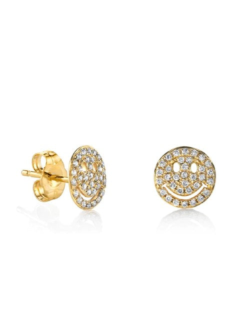 Gold earrings with diamond smiley face and gold backing. 