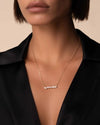Model wearing Willow Bar Necklace from Suzanne Kalan. 