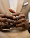 Man wearing Eternity Inlay Band Ring with tan suit.