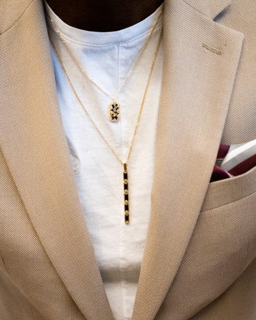 Man wearing Small Dog Tag Pendant Necklace with Inlay Bar Necklace.