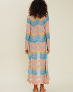 Back view of model wearing Solar Tie Front Maxi Cardigan. 