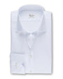 An overhead view of a folded white button-down shirt with a chest pocket including two buttons. The shirt has a white square label inside the collar that reads "Stenströms" in cursive. The background is white.