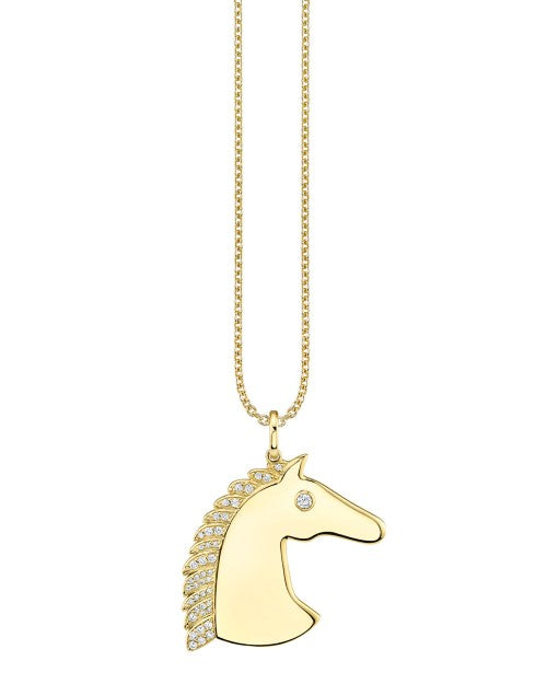 Gold necklace with gold horse head that has diamond eyes and mane. 