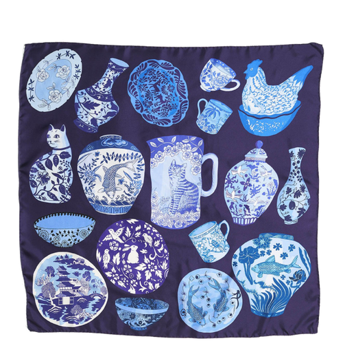 Navy blue silk scarf with various blue and white pottery creations as pattern. 