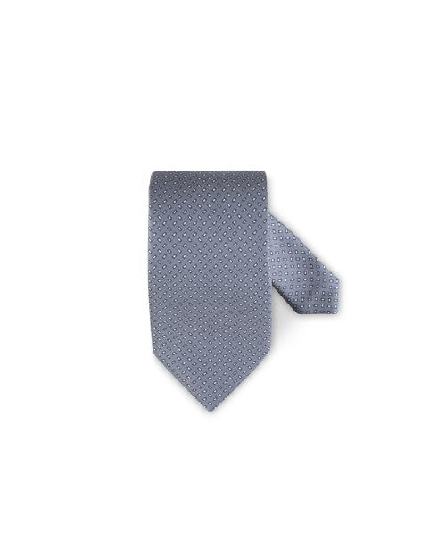 Patterned Silk Tie in grey in front of white background. 