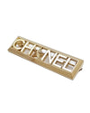 Gold brooch with Chanel in gold letters but "A" is a star.