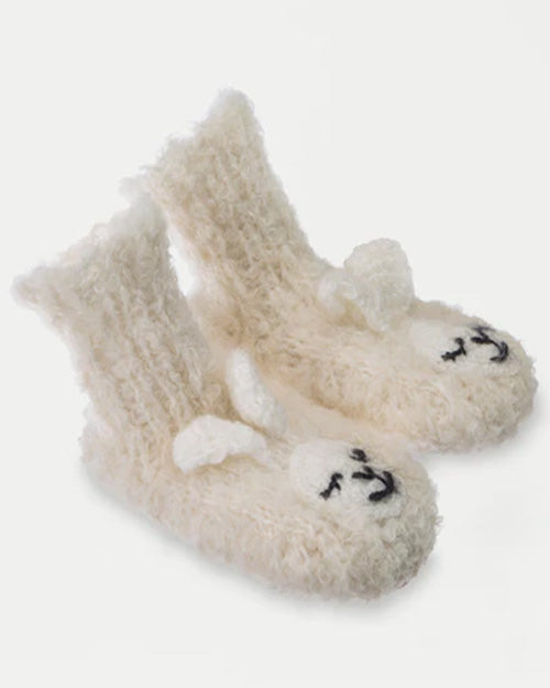 Side view of Baby Alpaca Slipper in white.