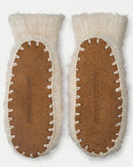 Bottom view of brown suede sole and stitch line for slipper.