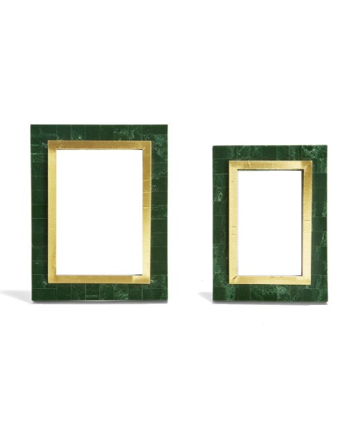 2 green and gold photo frames in front of white background. 