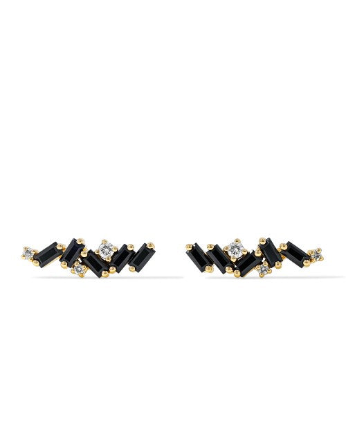 Black sapphires, white diamonds, and gold in a wavy line design for stud earrings.