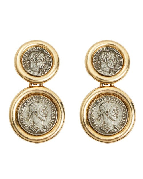 Golden droop earrings with Roman coins inside of gold hoops.