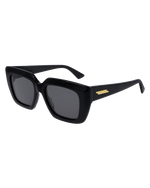 Bottega Veneta New Classic Woman Sunglasses in black in front of white background.