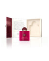 Hot pink Amouage Crimson Rock fragrance bottle in front of trifold packaging box. 
