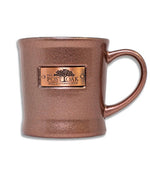 Close up of Copper Emblem Mug in Rosegold. 