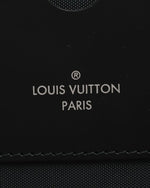 Close up of Louis Vuitton Paris tag on luggage.