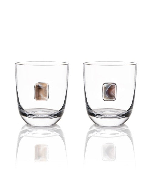Two glasses with smoked agate gemstone placed on the base.