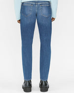 Backside of L'Homme Slim Crop Jeans showing 2 back pockets.