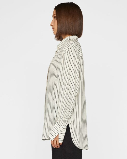 Side view of The Oversized Shirt. 