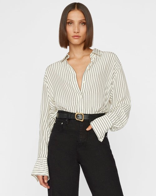 Model wearing The Oversized Shirt in Stripe Off White with black jeans.