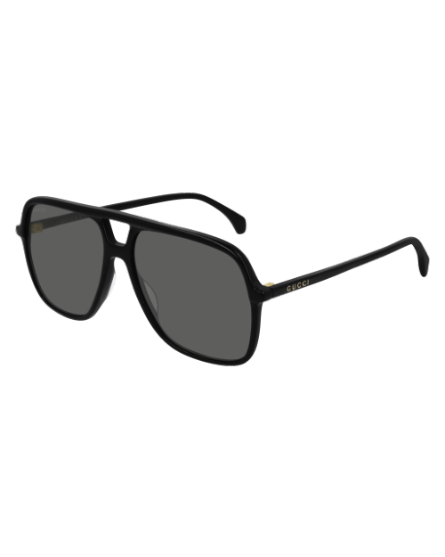 Gucci Logo Man Sunglasses in black in front of white background. 