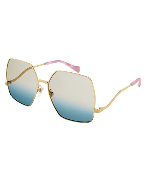 Gucci Logo Woman Sunglasses in gold in front of white background.