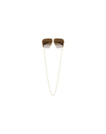 Gucci Chain Woman Sunglasses with entire chain showing in front of white background.