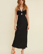 Model wearing Halley Front Chain Halter Maxi Dress in black. 